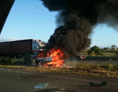 CAR ABLAZE: A car burning on the Tugun Bypass yesterday. Photo: Steve Barnes CAR ABLAZE: A car burning on the Tugun Bypass yesterday. Photo: Steve Barnes